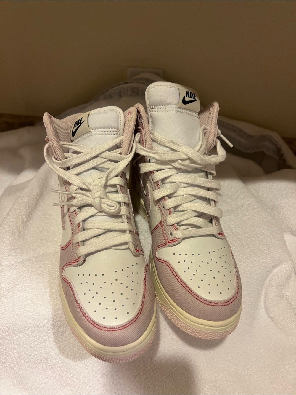 Nike High Top Sneakers in White and Light Pink Accents